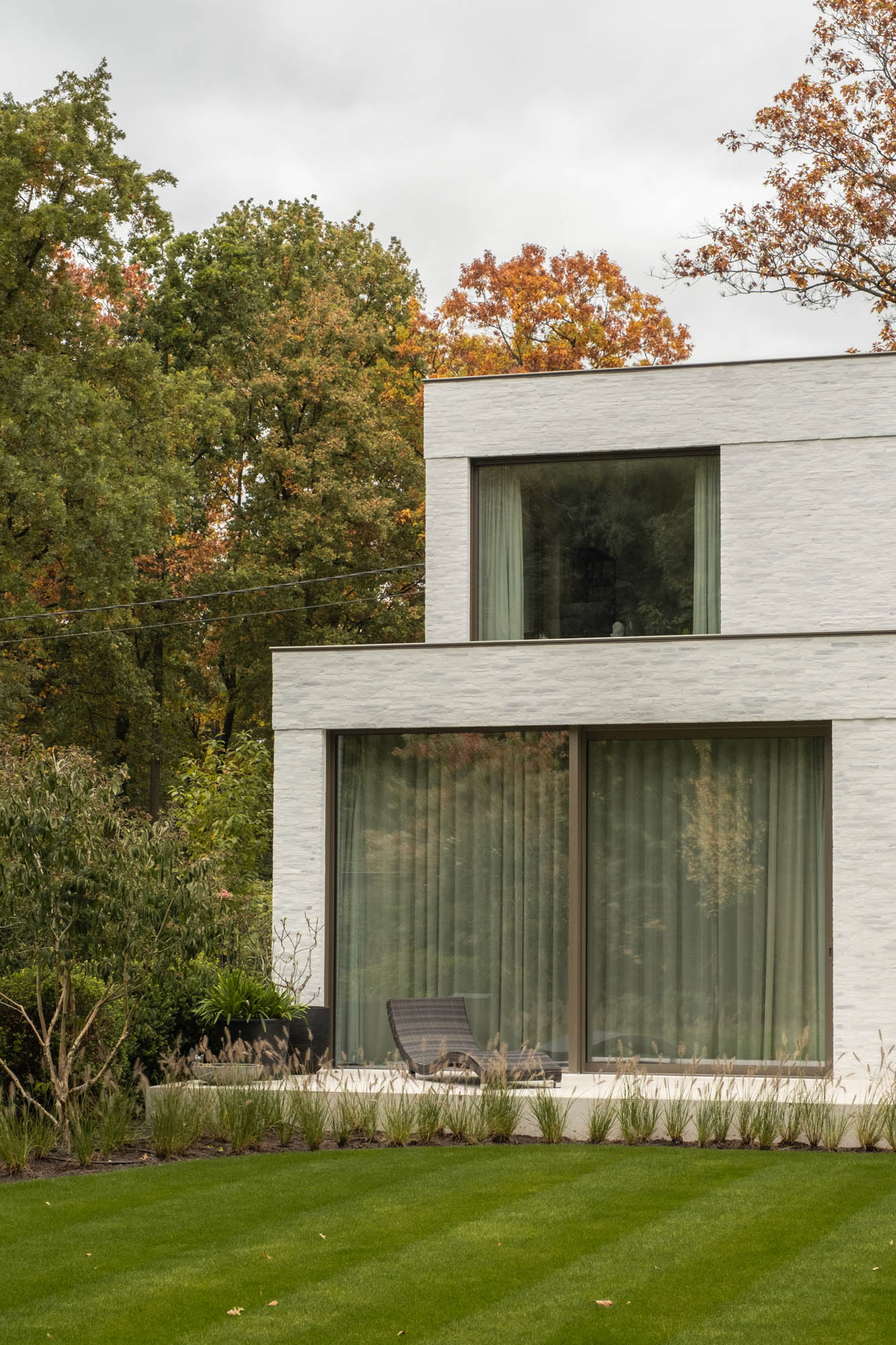 architectuur gevelmetselwerk en brons buitenschrijnwerk nieuwbouwwoning Zoersel
